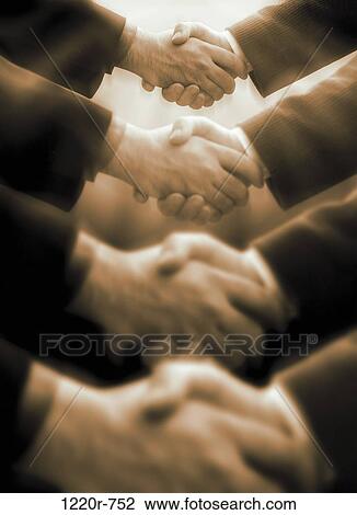 Row of business executives shaking hands View Large Photo Image Stock Image - Row of business executives shaking hands. Fotosearch