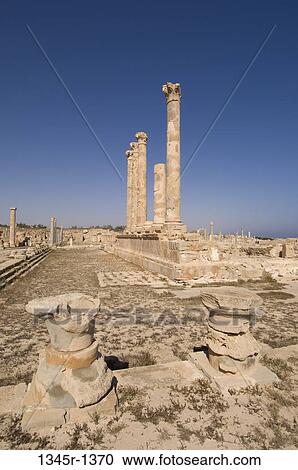 Stock Image - Ruins of buildings in an ancient Roman city, Sabratha, Tripolitania, Libya. Fotosearch