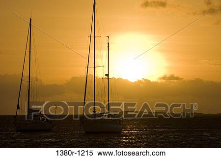 Sailboats in the sea, Los Roques National Park, Los Roques, Venezuela View Large Photo Image Stock Photography - Sailboats in the sea, Los Roques National Park, Los Roques, Venezuela. Fotosearch