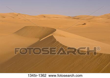 Sand dunes in a desert, Erg Awbari, Fezzan, Libya View Large Photo Image Stock Image - Sand dunes in a desert, Erg Awbari, Fezzan, Libya. Fotosearch