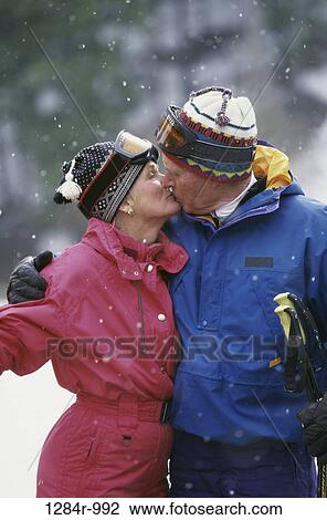 Stock Image - Senior couple kissing. Fotosearch