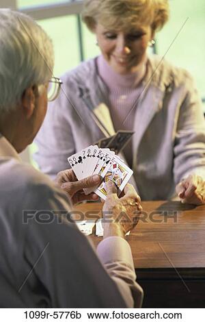 Senior couple playing cards View Large Photo Image Stock Image - Senior couple playing cards. Fotosearch