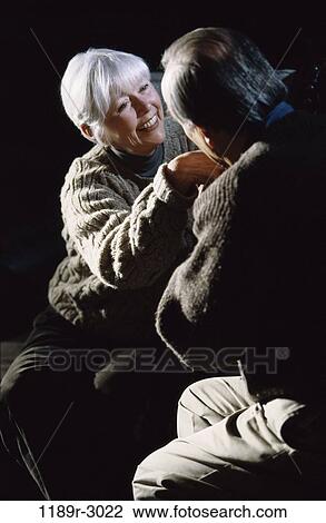 Senior couple sitting together View Large Photo Image Stock Image - Senior couple sitting together. Fotosearch