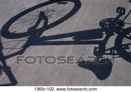 Shadow of a bicycle View Large Photo Image Stock Image - Shadow of a bicycle. Fotosearch