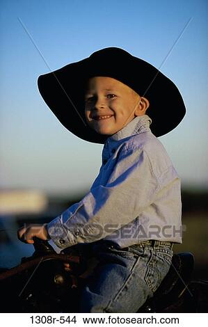 Side profile of a boy smiling View Large Photo Image Picture - Side profile of a boy smiling. Fotosearch