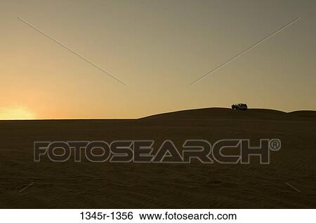 Silhouette of a 4x4 vehicle in a desert at sunset, Erg Awbari, Fezzan, Libya View Large Photo Image Stock Photograph - Silhouette of a 4x4 vehicle in a desert at sunset, Erg Awbari, Fezzan, Libya. Fotosearch