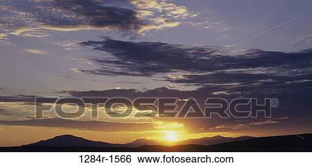 Silhouette of a mountain range during sunset, Battle Mountain, Nevada, USA View Large Photo Image Stock Photograph - Silhouette of a mountain range during sunset, Battle Mountain, Nevada, USA. Fotosearch