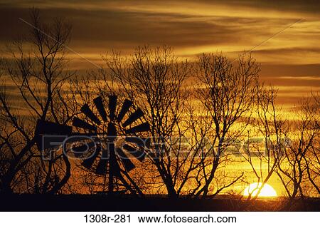 Silhouette of a wind turbine during sunset, Barber, Kansas, USA View Large Photo Image Stock Image - Silhouette of a wind turbine during sunset, Barber, Kansas, USA. Fotosearch