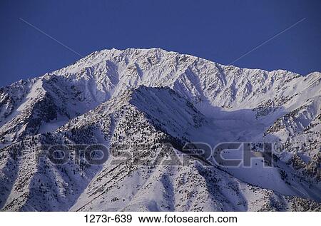 Snow covered mountains, Sierra Nevada, California, USA View Large Photo Image Stock Photo - Snow covered mountains, Sierra Nevada, California, USA. Fotosearch