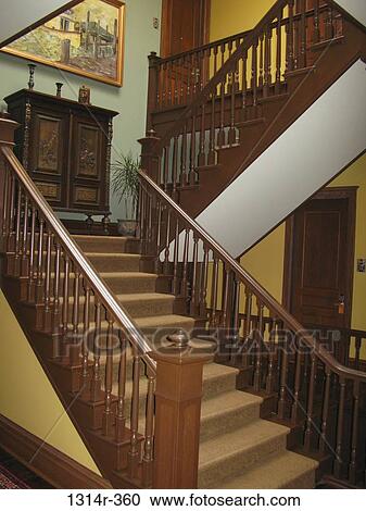 Stock Image - Staircase in old hotel. Fotosearch