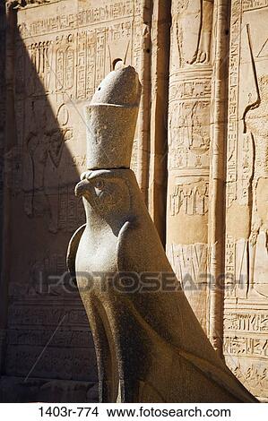 Picture - Statue of Horus inside the courtyard of the 3rd century B. C. Ptolemaic era Temple of Horus at Edfu. Fotosearch