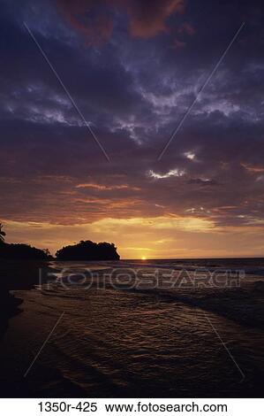 Stock Photography - Sunset over a beach, Venezuela. Fotosearch