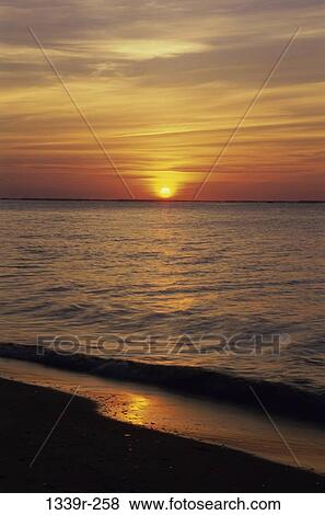 Sunset over the ocean, Chesapeake Bay, Maryland, Virginia, USA View Large Photo Image Stock Photo - Sunset over the ocean, Chesapeake Bay, Maryland, Virginia, USA. Fotosearch