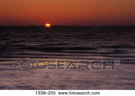 Sunset over the ocean, Chesapeake Bay, Maryland, Virginia, USA View Large Photo Image Stock Photography - Sunset over the ocean, Chesapeake Bay, Maryland, Virginia, USA. Fotosearch