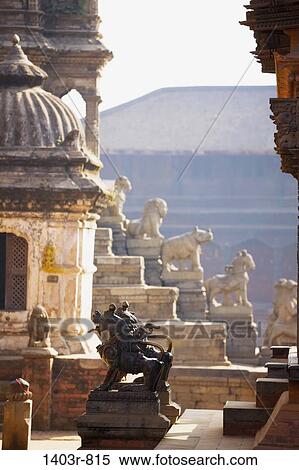 Stock Photography - Temple statues in Durbar Square in Bhaktapur, Nepal. Fotosearch