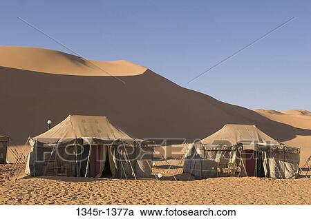 Tents in a desert, Erg Awbari, Fezzan, Libya View Large Photo Image Stock Image - Tents in a desert, Erg Awbari, Fezzan, Libya. Fotosearch