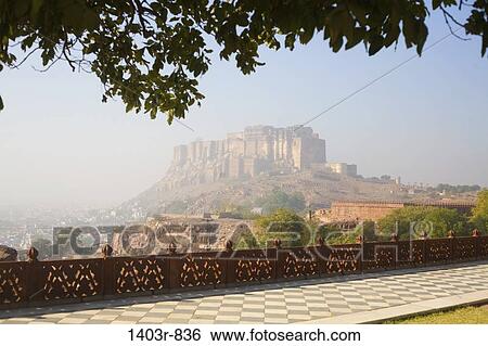 The 15th century Mehrangarh Fortress seen from the grounds of the Jaswant Thada Memorial high over Jodhpur, India in Rajasthan state View Large Photo Image Stock Photograph - The 15th century Mehrangarh Fortress seen from the grounds of the Jaswant Thada Memorial high over Jodhpur, India in Rajasthan state. Fotosearch