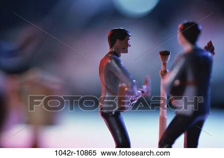 Toy model of two men playing guitars View Large Photo Image Stock Photography - Toy model of two men playing guitars. Fotosearch