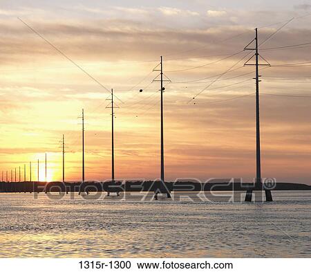 USA, Florida Keys, Islamorada, power poles at sunset View Large Photo Image Stock Image - USA, Florida Keys, Islamorada, power poles at sunset. Fotosearch
