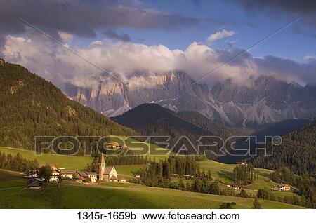 Village with mountain range on a landscape, Santa Maddalena, Funes Valley, Dolomites, Trentino-Alto-Adige, Italy View Large Photo Image Stock Image - Village with mountain range on a landscape, Santa Maddalena, Funes Valley, Dolomites, Trentino-Alto-Adige, Italy. Fotosearch