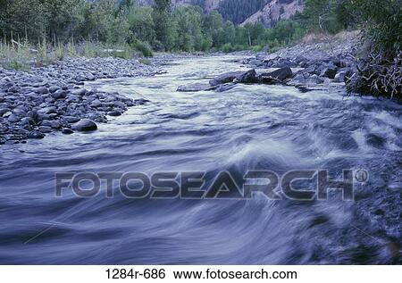 Water flowing at Big Wood River, Idaho, USA View Large Photo Image Stock Photograph - Water flowing at Big Wood River, Idaho, USA. Fotosearch