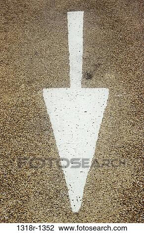 White arrow sign painted on road surface View Large Photo Image Stock Image - White arrow sign painted on road surface. Fotosearch