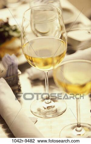 Stock Image - Wineglasses on a table. Fotosearch