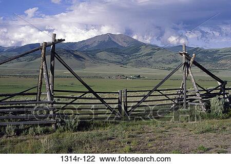 Stock Image - Wooden fence in a field, Baldy Mountain, Grasshopper Creek Valley, Montana, USA. Fotosearch