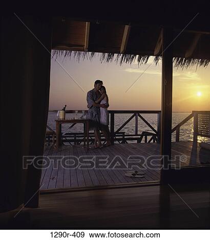 Young couple hugging, Maldives View Large Photo Image Stock Photo - Young couple hugging, Maldives. Fotosearch