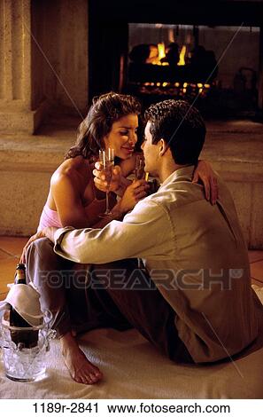 Young couple looking at each other View Large Photo Image Stock Image - Young couple looking at each other. Fotosearch