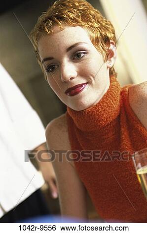 Stock Photograph - Young woman smiling. Fotosearch