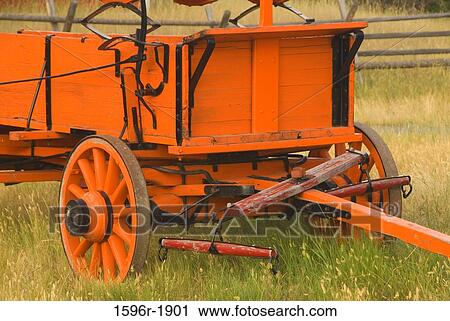 Stock Image - Abandoned wagon in a field, Grant-Kohrs Ranch National Historic Site, Montana, USA. Fotosearch