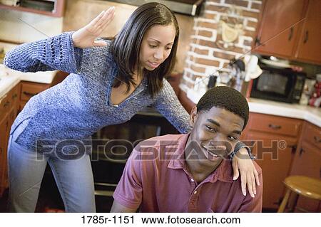 African American brother and sister in kitchen View Large Photo Image Stock Image - African American brother and sister in kitchen. Fotosearch
