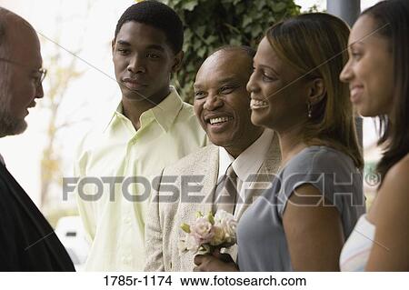 Picture - African American couple renewing vows. Fotosearch