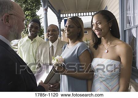 Stock Image - African American couple renewing vows. Fotosearch