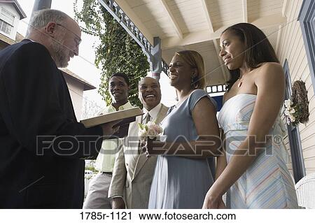 Stock Image - African American couple renewing vows. Fotosearch
