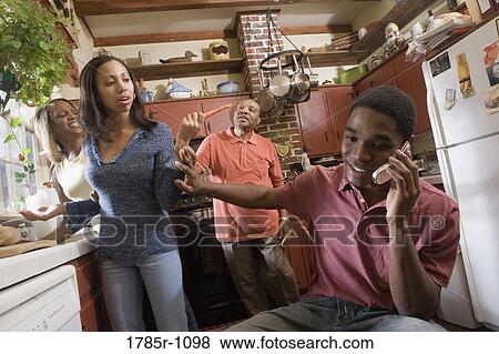 African American family in kitchen View Large Photo Image Stock Photo - African American family in kitchen. Fotosearch