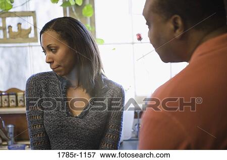 African American father lecturing daughter in kitchen View Large Photo Image Stock Photo - African American father lecturing daughter in kitchen. Fotosearch