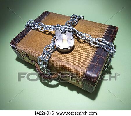 Antique suitcase wrapped with chain and padlock View Large Photo Image Stock Photograph - Antique suitcase wrapped with chain and padlock. Fotosearch