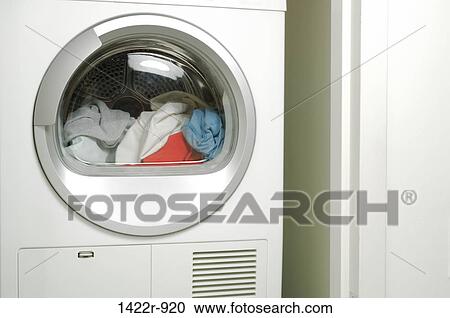 Assorted clothing inside laundry tumble dryer View Large Photo Image Stock Image - Assorted clothing inside laundry tumble dryer. Fotosearch