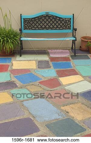 Stock Image - Bench on a tiled floor, Spanish Village Art Center, Balboa Park, San Diego, California, USA. Fotosearch
