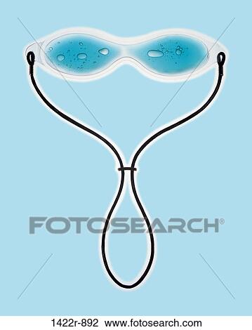 Stock Image - Blue gel cooling spa eyeglasses. Fotosearch