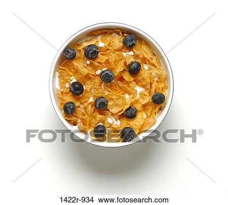 Picture - Bowl of breakfast cereal with blueberries. Fotosearch