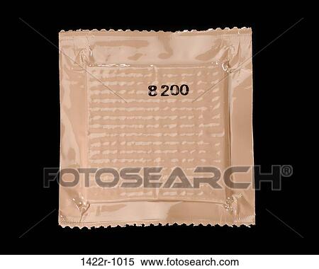 Stock Photography - Brown package with vacuum packed food. Fotosearch