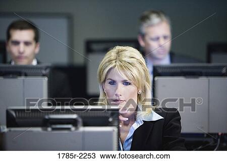 Business colleagues at a computer training seminar View Large Photo Image Stock Image - Business colleagues at a computer training seminar. Fotosearch