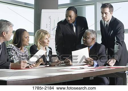 Business colleagues in a meeting View Large Photo Image Picture - Business colleagues in a meeting. Fotosearch