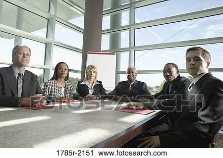 Business colleagues in a meeting View Large Photo Image Stock Image - Business colleagues in a meeting. Fotosearch