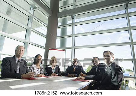 Business colleagues in a meeting View Large Photo Image Stock Image - Business colleagues in a meeting. Fotosearch