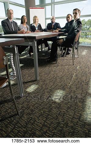 Business colleagues in a meeting View Large Photo Image Stock Image - Business colleagues in a meeting. Fotosearch