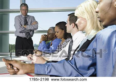 Business colleagues in a meeting View Large Photo Image Stock Photo - Business colleagues in a meeting. Fotosearch